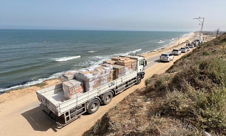 United Nations and World Health Organization aid trucks wait for Israel's permission before entering Gaza on April 23, 2024.