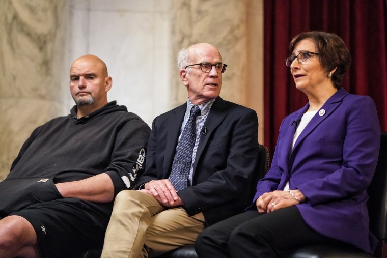 Sens. John Fetterman, D-Pa., and Peter Welch, D-Vt., and Rep. Suzanne Bonamici, D-Ore., are interviewed at the Capitol about legislation to fund theaters on April 11.