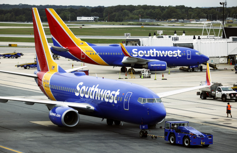 Two Southwest Airlines airplanes taxied at Baltimore Washington International Thurgood Marshall Airport in Baltimore, Maryland.