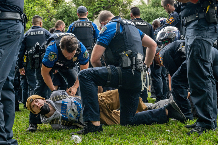 A student is arrested during a demonstration in support of Gaza at the The University of Texas at Austin on April 24, 2024.