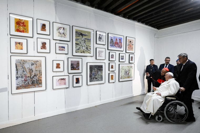 Pope Francis meets with artists during his visit to the Holy See Pavilion