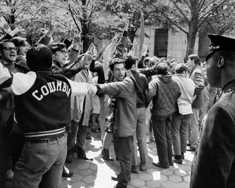 Student demonstrators and police officers at Columbia University