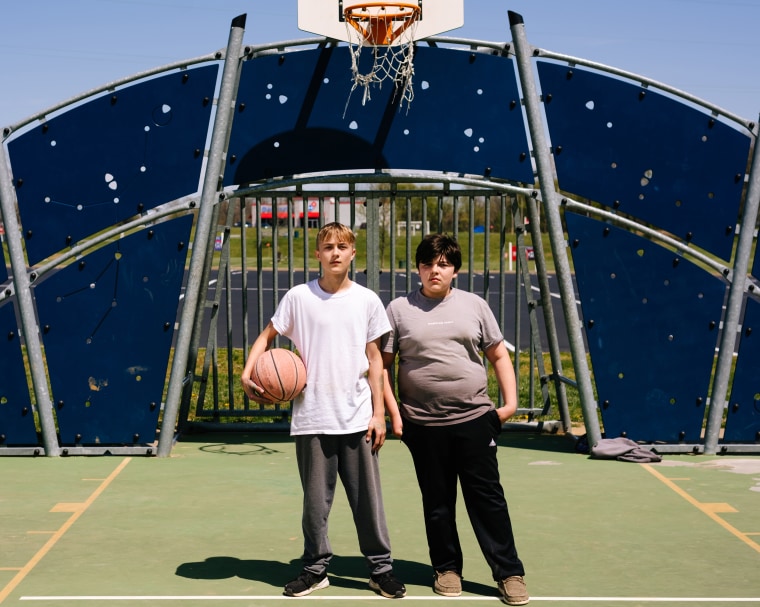 Garrett and Floyd on a Perryville basketball court.