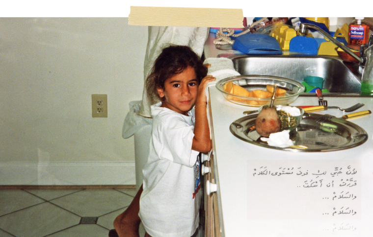Young Zeina in the kitchen.