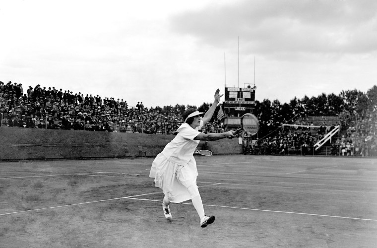Helen Wills of the USA in play during the doubles match between Wills and Hazel Wightman and British duo Phyllis Covell and Kathleen McKane. Wills and Wightman won the gold.