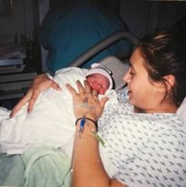 Jennifer holding Adrianna as a newborn