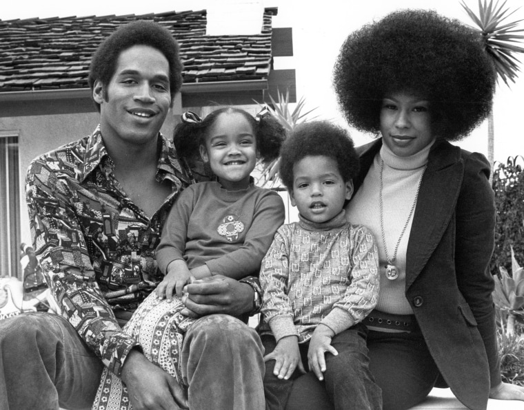 O.J. Simspson poses for a portrait with his wife Marguerite (Whitley) Simpson, daughter Arnelle and son Jason 