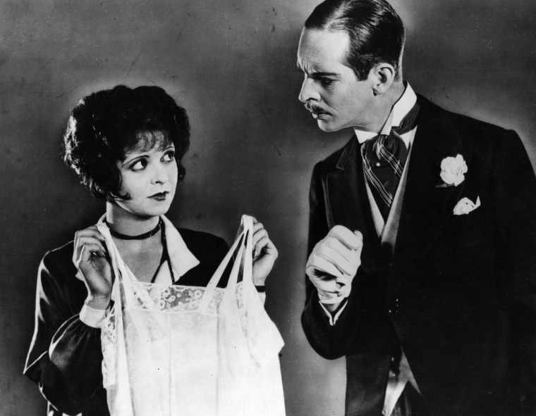 Clara Bow and William Austin in a scene from the 1927 film 'It'.  