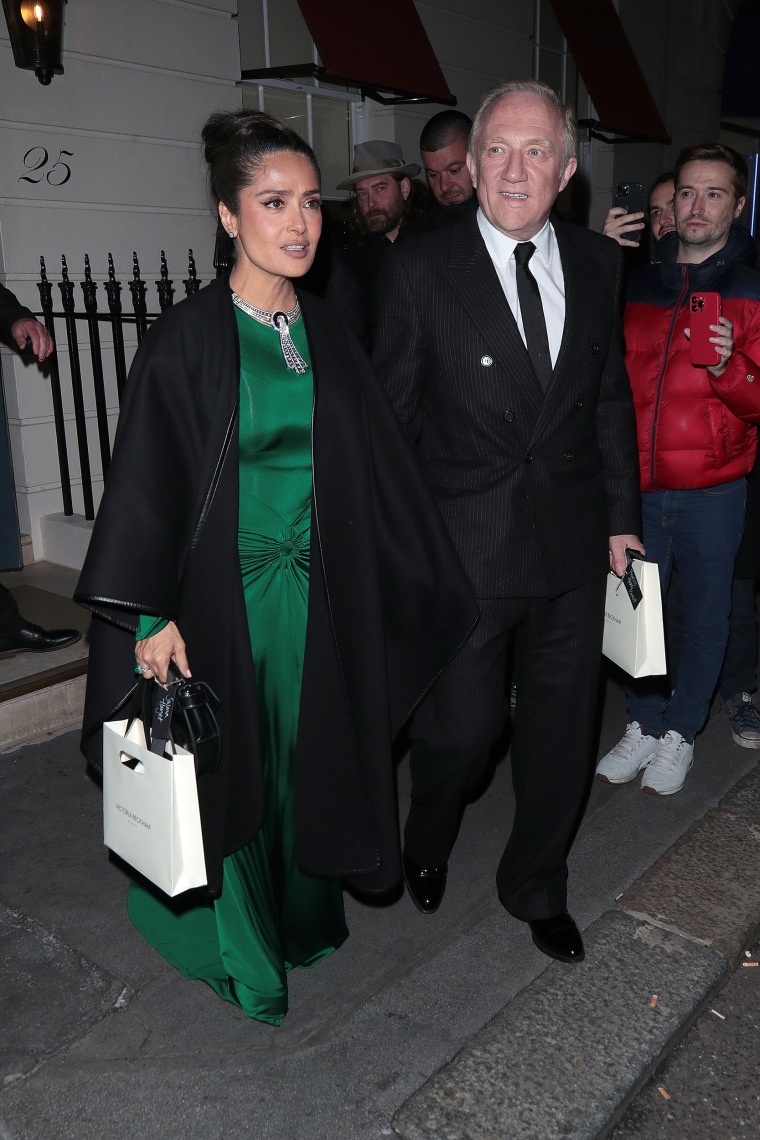 Salma Hayek and François-Henri Pinault are seen leaving Victoria Beckham - 50th birthday party at Oswald’s on April 20, 2024 in London, England.