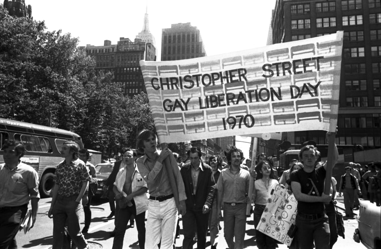 Men holding Christopher Street Liberation Day banner, 1970