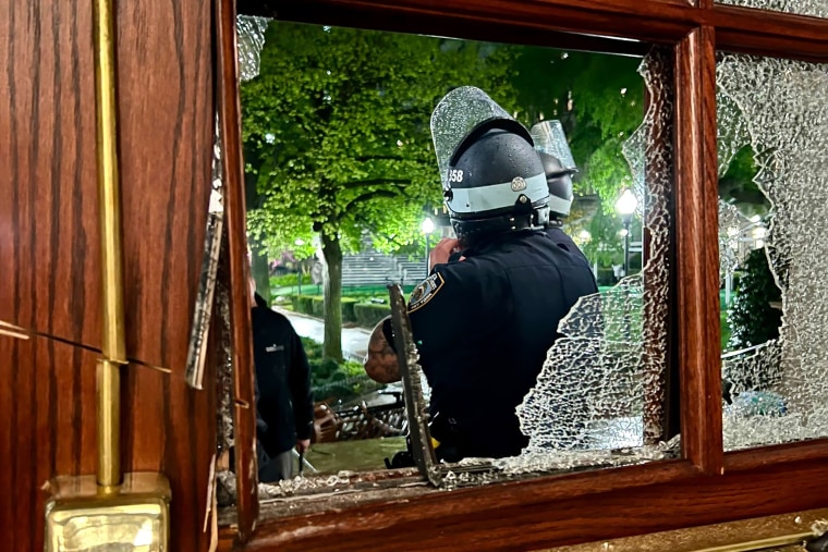 columbia university hamilton hall unrest israel hamas conflict protest nypd riot gear broken glass door