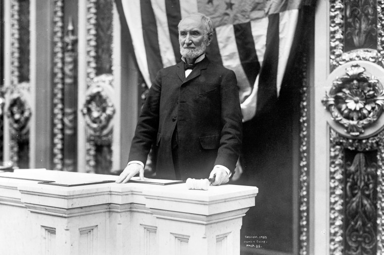 Joseph G. Cannon holds a gavel.