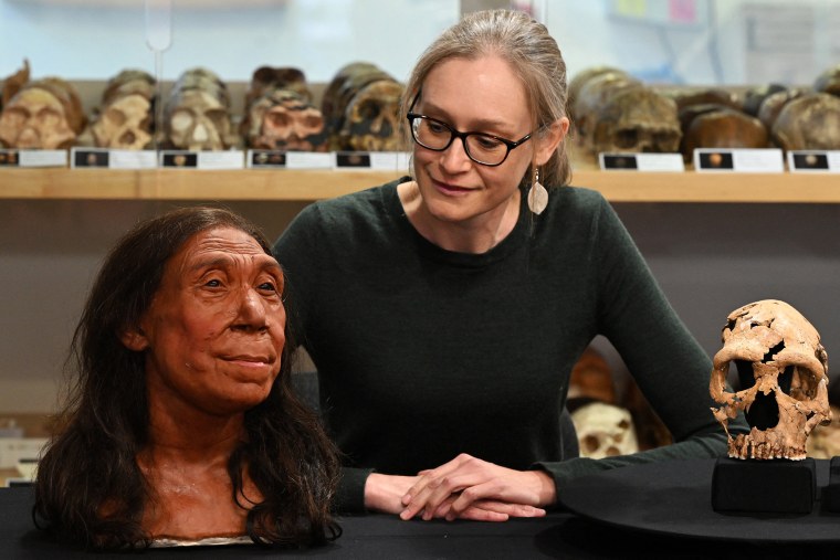 A UK team of archaeologists on Thursday revealed the reconstructed face of a 75,000-year-old Neanderthal woman as researchers reappraise the perception of the species as brutish and unsophisticated. Emma Pomeroy, the Cambridge palaeo-anthropologist who uncovered Shanidar Z, said finding her skull and upper body had been both "exciting" and "terrifying". 