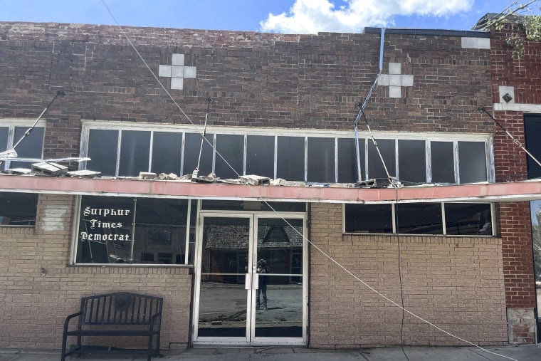 Image: Damage surrounds the Sulphur Times-Democrat building from a tornado