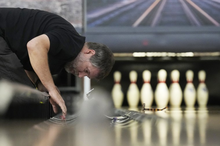 The bowling alley, where eight people were killed, was scheduled to reopen Friday, May 3. An additional 10 people were killed at nearby bar.