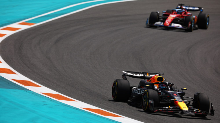Max Verstappen drives the Oracle Red Bull Racing RB20 and leads Charles Leclerc driving the Ferrari SF-24