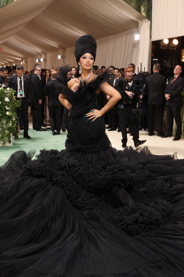 Cardi B is understated in all black yet maximalist in size and height. We love.