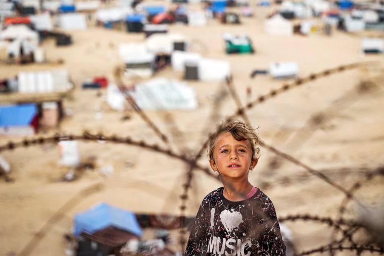 Palestinian children inside an encampment in Rafah, southern Gaza. 