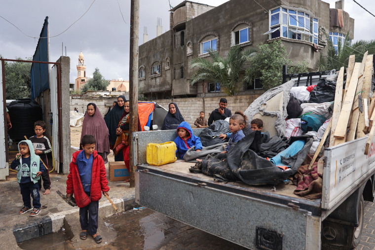 Displaced Palestinian civilians flee the southern city of Rafah