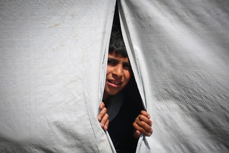 Displaced Palestinians at an encampment in Rafah, southern Gaza.