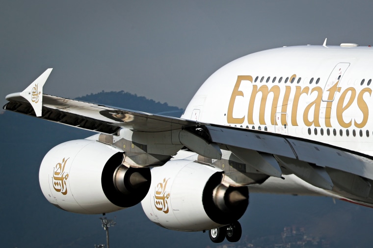 Emirates airplane in the sky.