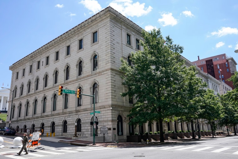 A pedestrian passes by the US 4th Circuit Court of Appeals Courthouse