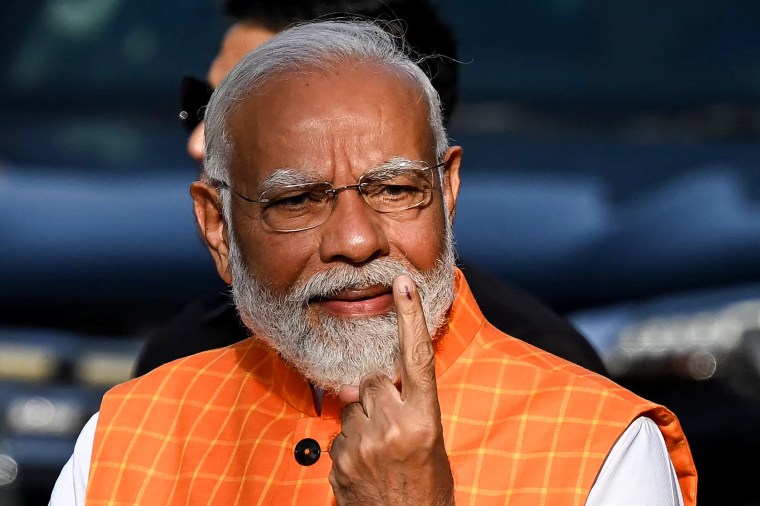 Prime Minister Narendra Modi voted early on Tuesday as India held the third phase of a massive general election, when seats in his home state Gujarat and 10 other regions will be decided.
