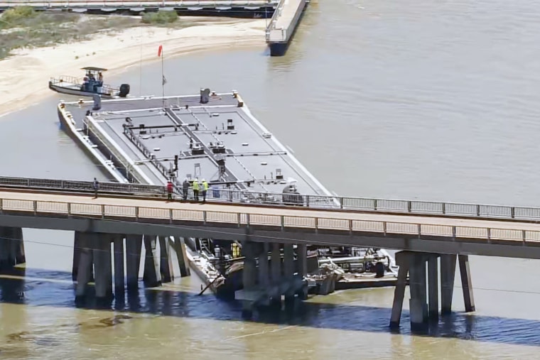 A barge slammed into a bridge in Galveston, Texas, on Wednesday.