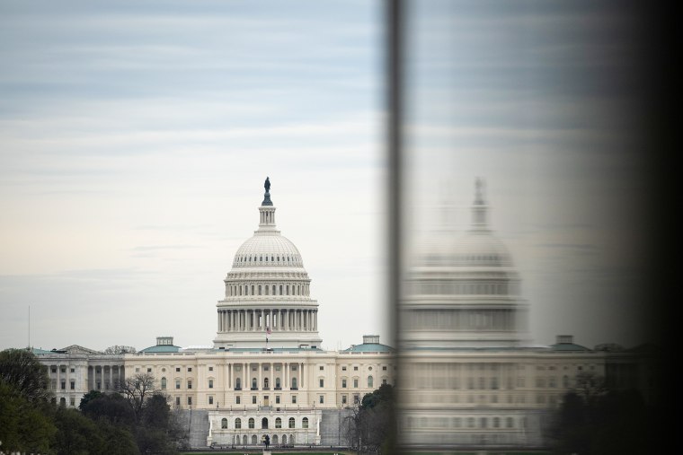 Image: U.S. Capitol Building and National Mall reflection exterior building