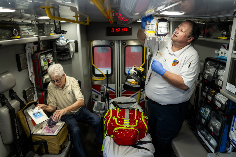 Dr. John Holcomb and Eric Bank with Harris county Emergency Services demonstrate how blood and plasma can be administered in a properly equipped ambulance.