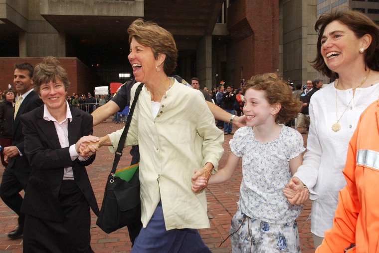 Hillary Goodridge (2nd-L), Julie Goodrid first same-sex couple marriage license in boston massachussetts