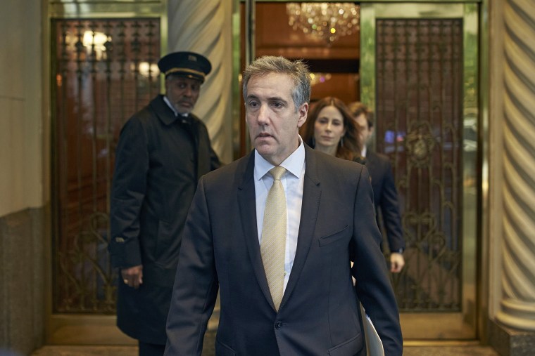 Michael Cohen departs his apartment building 