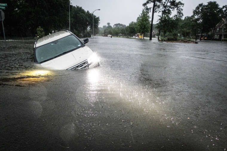 A car is stranded after severe flooding in Spring, Texas, on May 2, 2024.