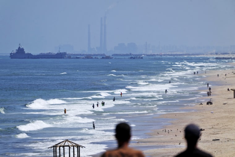 First support flows into Gaza over large U.S. pier