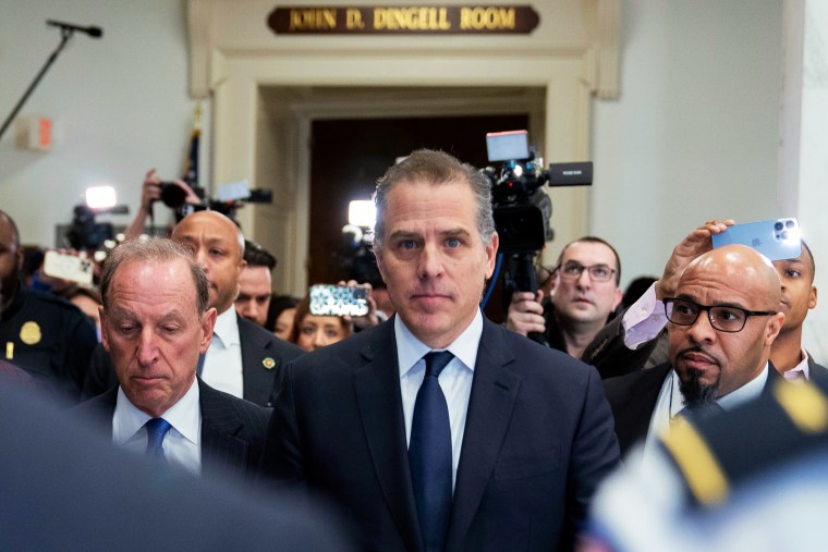 Hunter Biden with his lawyer and media