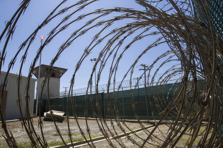 The control tower is seen through the razor wire inside the Camp VI detention facility in Guantanamo Bay Naval Base, Cuba, in 2019. 