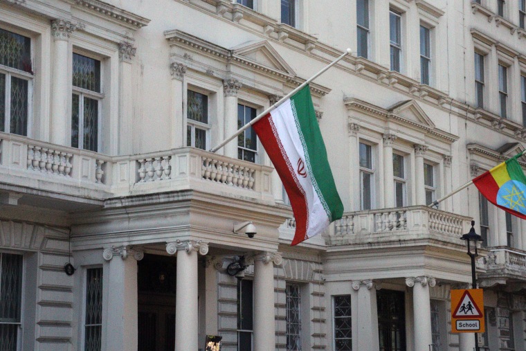 The Iranian flag flies at half-mast at the country's embassy in London on Monday. 