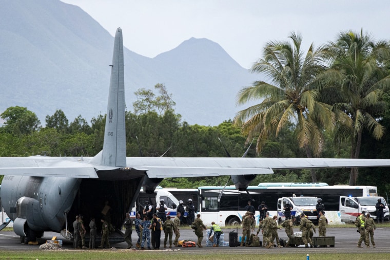 An aircraft being prepared to evacuate people.