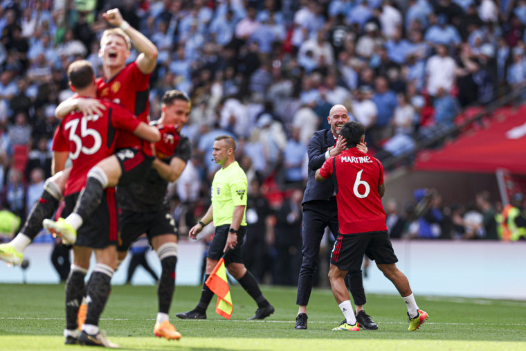 Manchester United team celebrates.