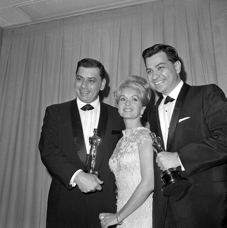 Robert Sherman, left, actor Debbie Reynolds and Richard M. Sherman