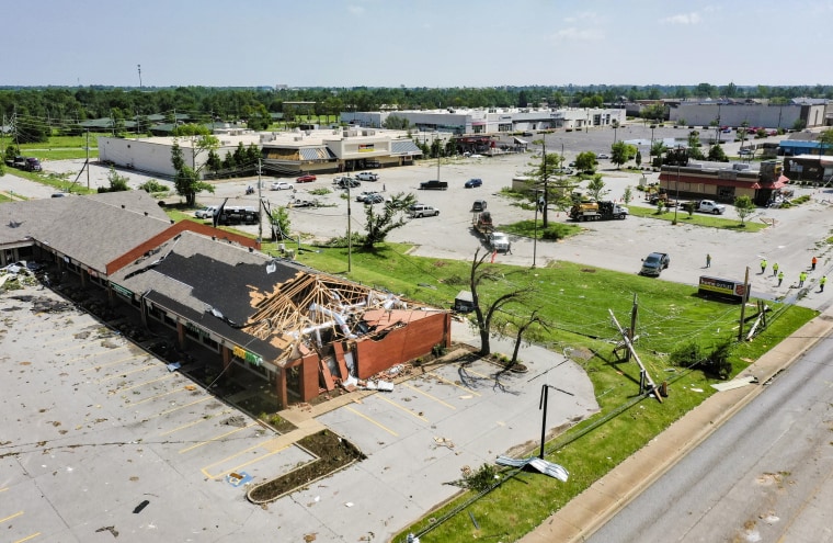 Storm damage at a shopping center in Rogers, Ark., on Sunday.