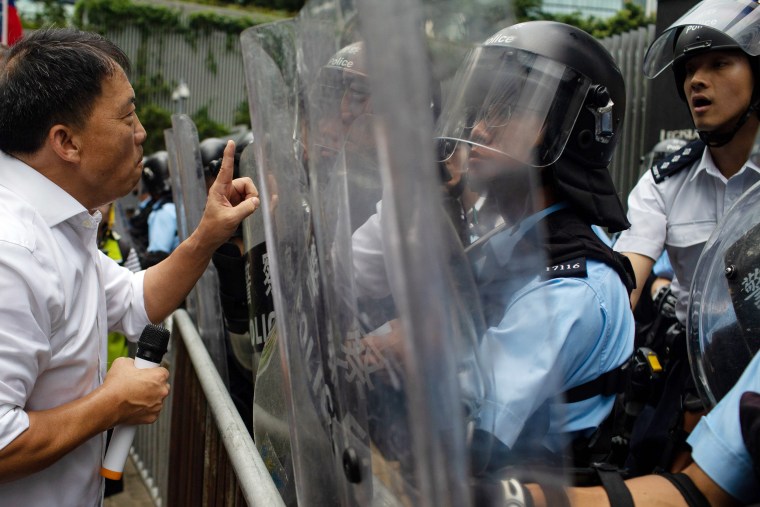 Wu Chi-wai confronts riot police