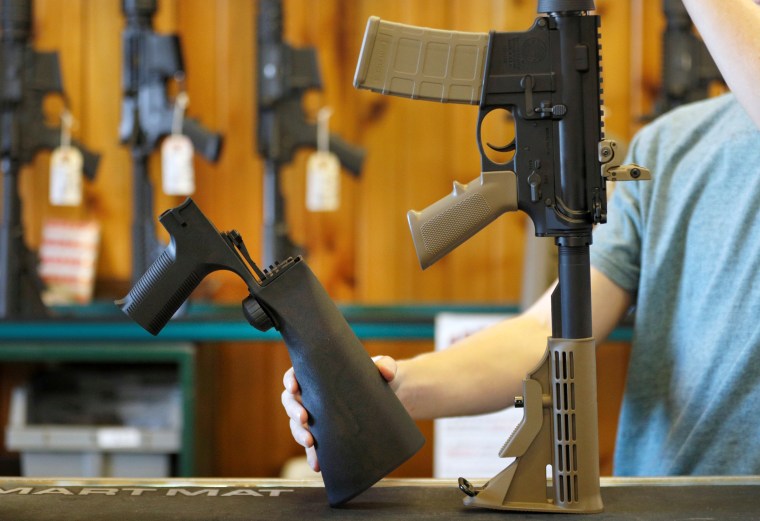 A bump fire stock that attaches to a semi-automatic rifle to increase the firing rate is seen at Good Guys Gun Shop in Orem