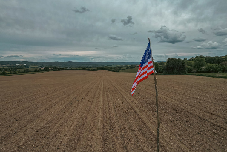 Locals erected a makeshift American flag marking the site where Chaufty’s plane crashed in near the village of St. Elliers Les Bois, France.