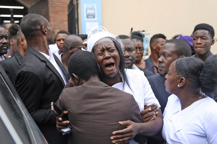 Eunide Majeur Montis, the wife of slain mission director Judes Montis, after attending his funeral service in Port-au-Prince, Haiti, Tuesday, May 28, 2024.