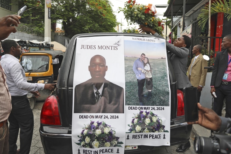 A funeral procession for mission director Judes Montis