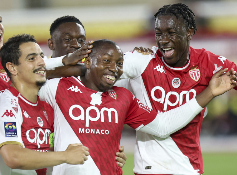 Monaco player Mohamed Camara, center, celebrating with teammates during a match against Nantes, in Monaco