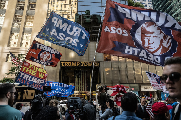 Crowds gather in front of Trump Tower prior to a press conference by former U.S. President Donald Trump in New York City. 
