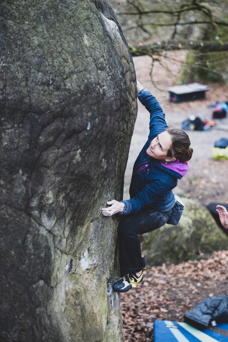 Beth Rodden climbing a boulder 
