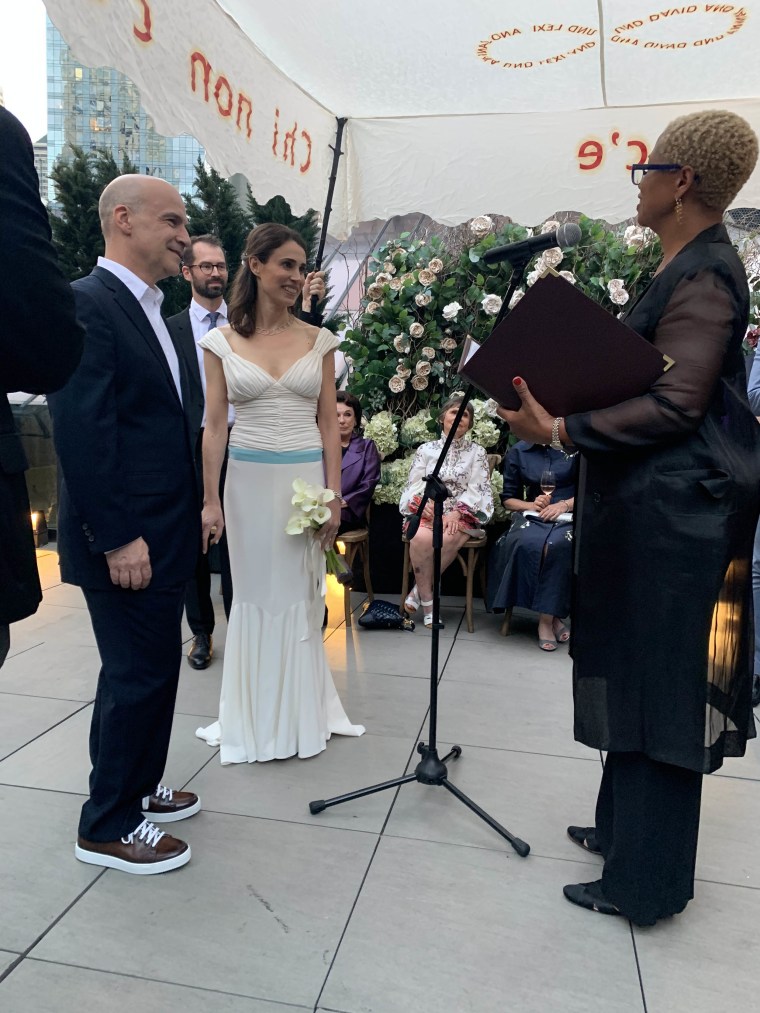 Bianca and Peter Turetsky getting married on a city rooftop